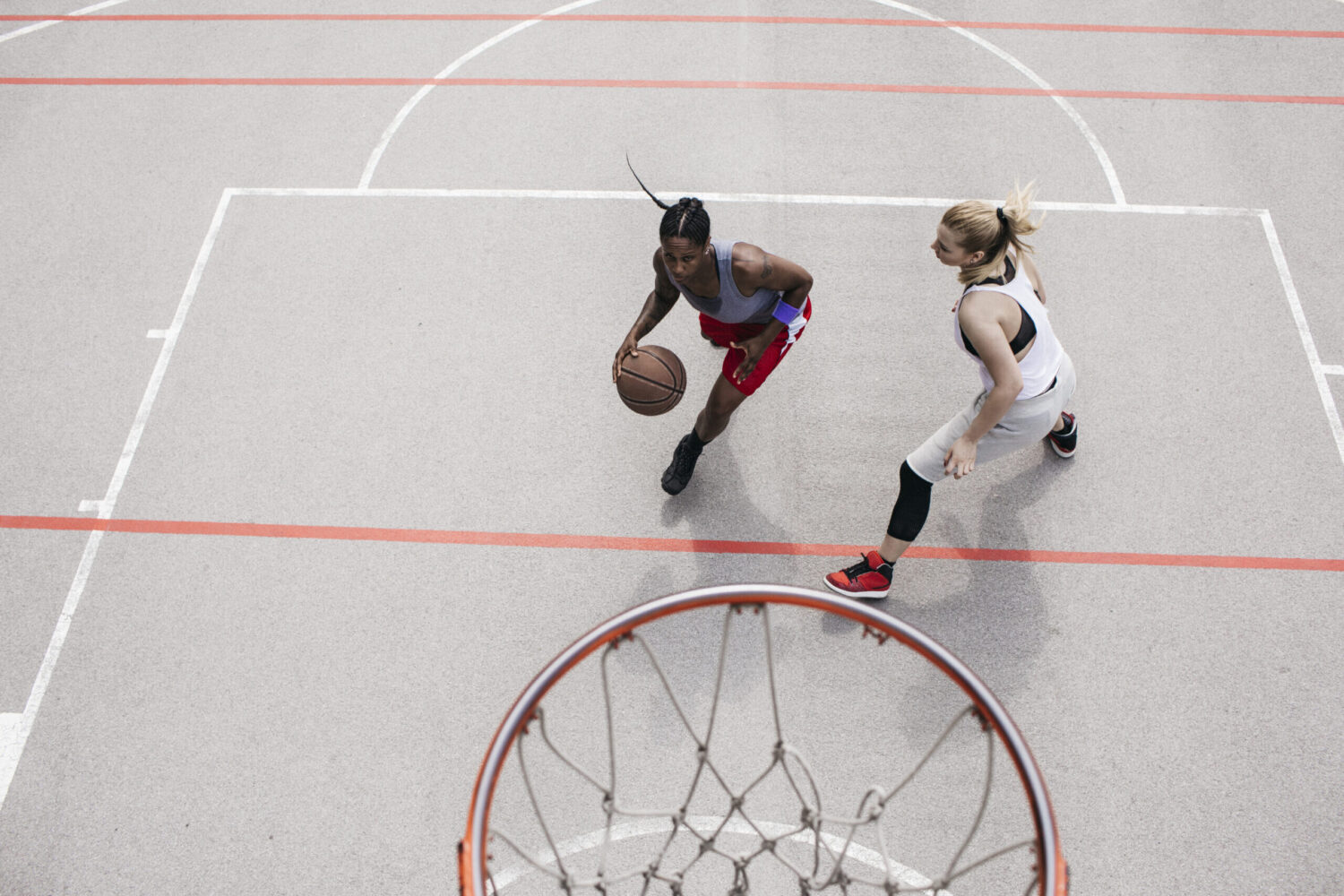 Two basketball players pivot around one another to line up a shot. It represents a strategic reorientation on AI competition with China.