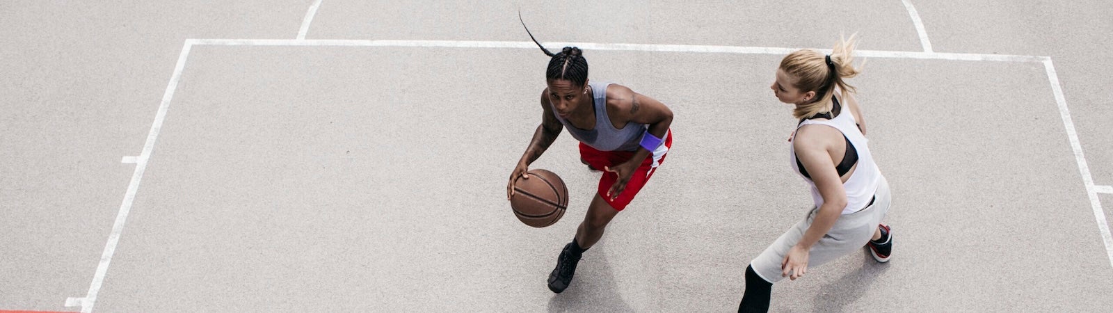 Two basketball players pivot around one another to line up a shot. It represents a strategic reorientation on AI competition with China.
