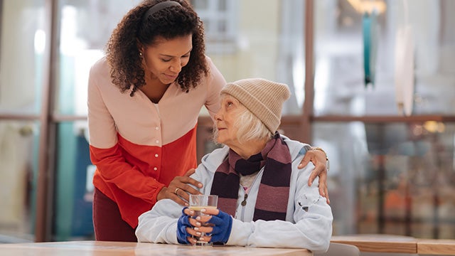 Housing volunteer with woman