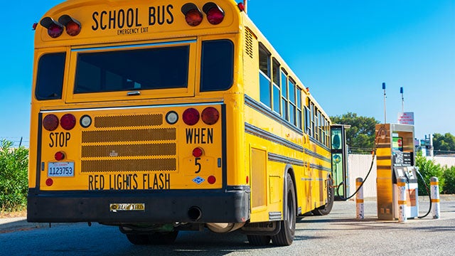 School bus stopped for fuel