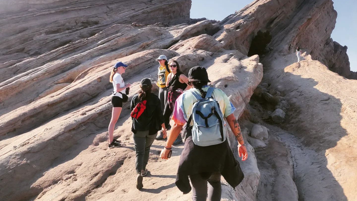 Folks in the Los Angeles, CA, Spirituality In Nature Group hike together on the Vasquez Rocks trail during a monthly outing. Photo credit: Center for Spirituality in Nature