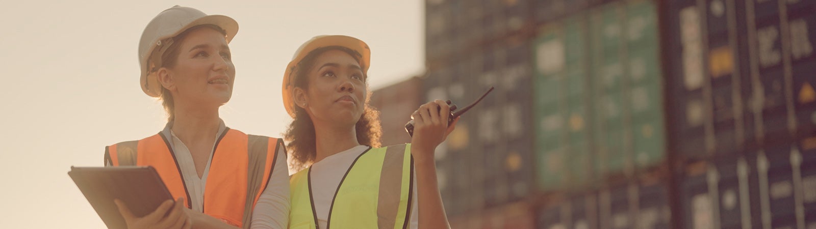 Two female shipping workers